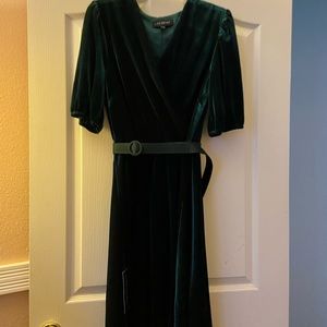 Green belted velvet dress